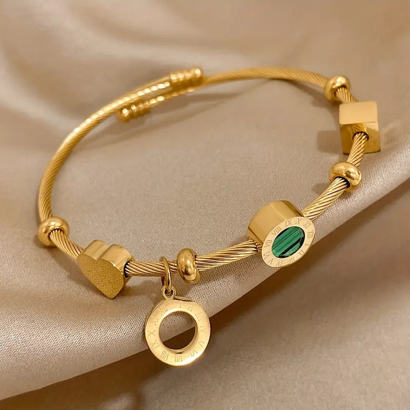 Emerald Charm Bangle – Time & Renewal