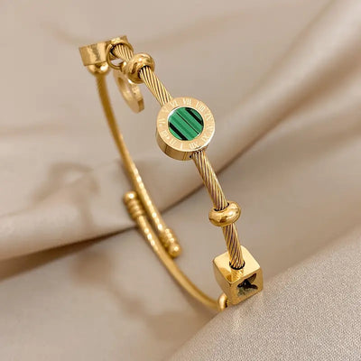 Emerald Charm Bangle – Time & Renewal