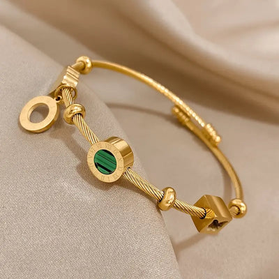 Emerald Charm Bangle – Time & Renewal